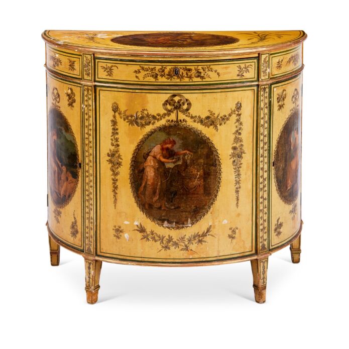 Small George III painted and decorated demi-lune commode. Sold for £9,000