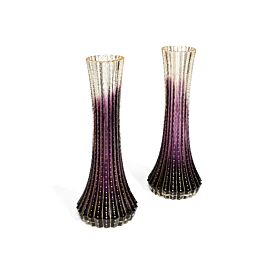 A pair of early 20th century Bohemian amethyst cut glass vases attributed to Moser