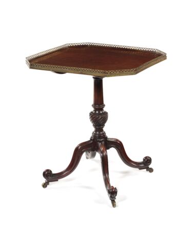 A fine George III carved mahogany centre table in the manner of Thomas Chippendale. Sold for £27,300