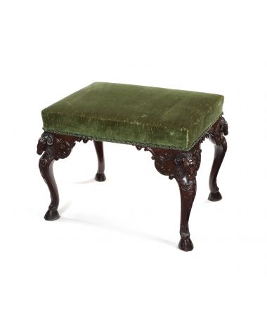 A late 19th century carved mahogany stool in the Adam style