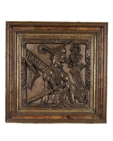 A set of three carved oak panels, English, circa 1550. Sold for £15,600