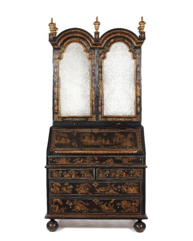 A Queen Anne black japanned bureau cabinet. Sold for £36,000