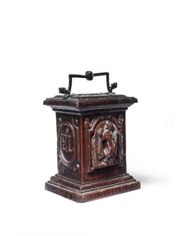 An oak or chestnut alms box, late 16th / early 17th century. Sold for £4160