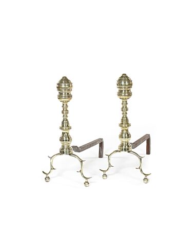 A pair late 18th/early 19th century North American polished brass andirons