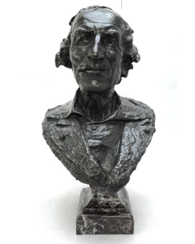 A French 19th century bronze bust by Jean-Baptiste Carpeaux, known as “Le Fumeur” dated 1869