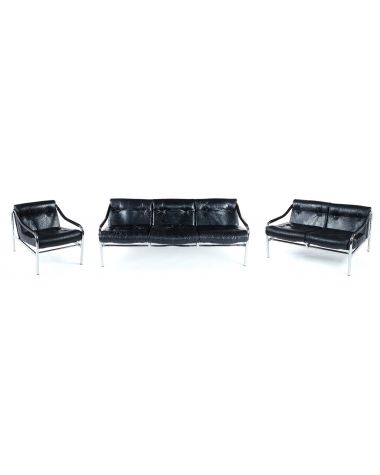 A mid 1970's black leather and chrome suite of Kadia seat furniture by Pieff