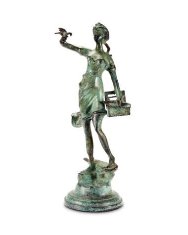 Mid-Century verdigris bronze figure of a girl releasing doves