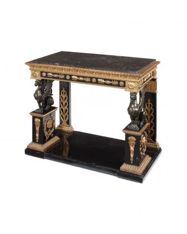 A 19th century and later, ebonised, gilt wood and composition console table