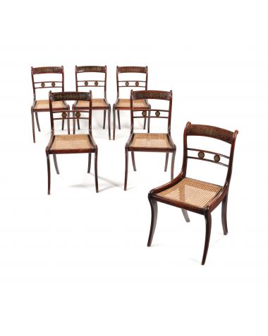 A set of six Regency simulated rosewood and brass inlaid dining chairs