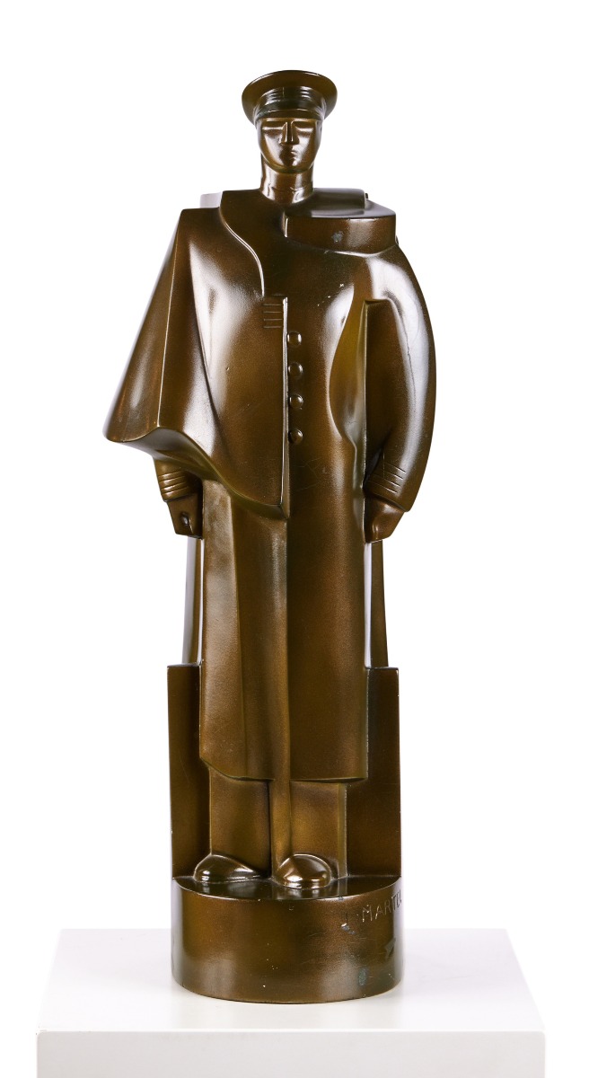 Jan & Joël Martel: An Art Deco green bronzed figure of a soldier 