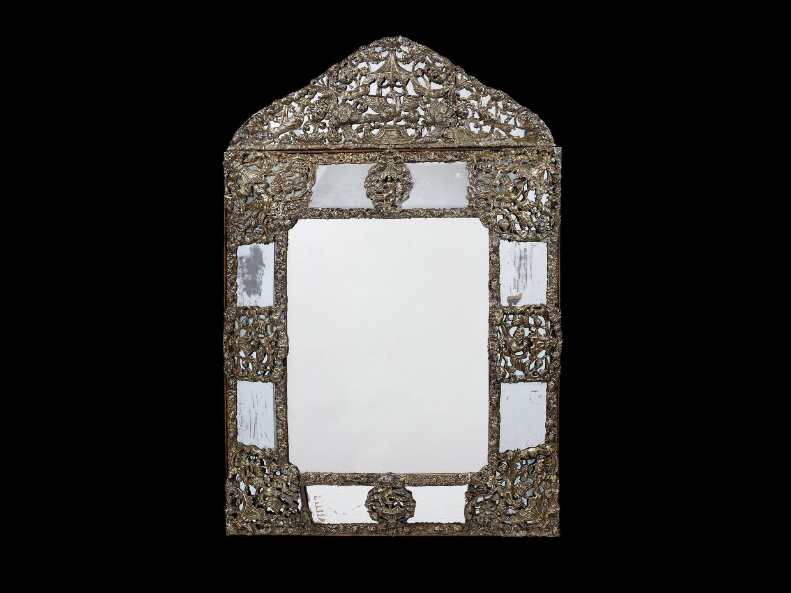 17thc. Flemish repoussé gilt-brass cushion frame marginal mirror