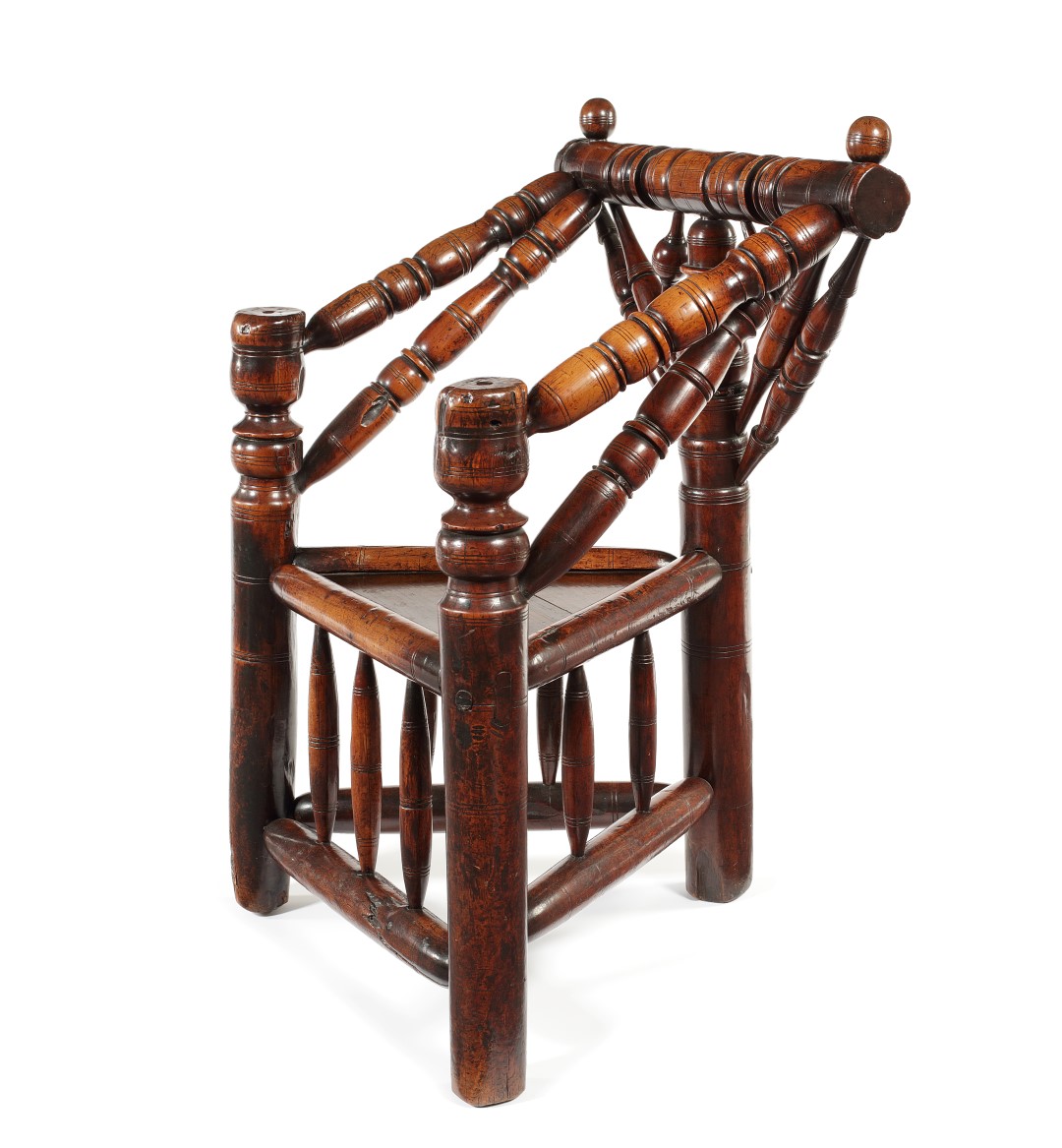 A Charles I yew triangular Turner's chair