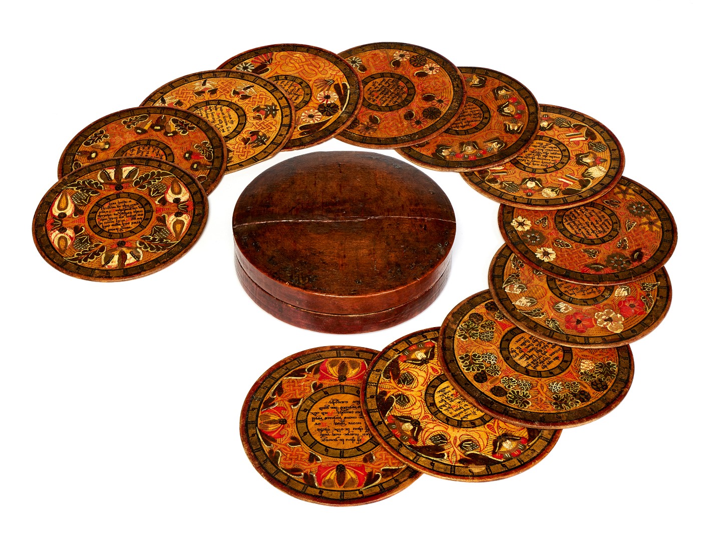 A rare set of twelve Elizabethan sycamore painted roundels 
