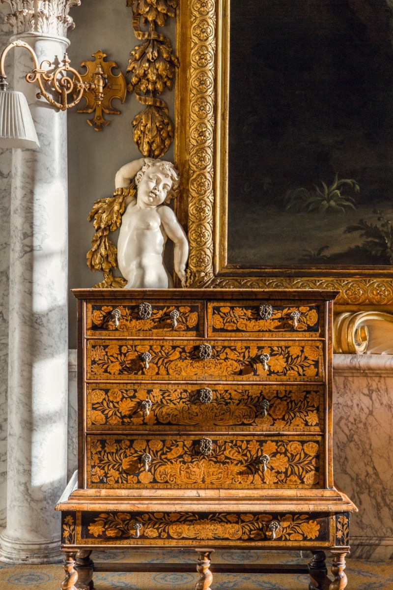 A William and Mary walnut and sycamore floral and bird marquetry chest on stand 