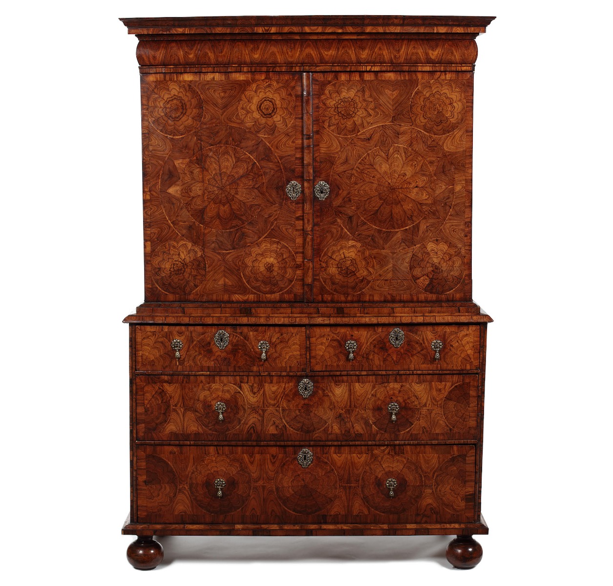 A William and Mary kingwood oyster veneered cabinet on chest