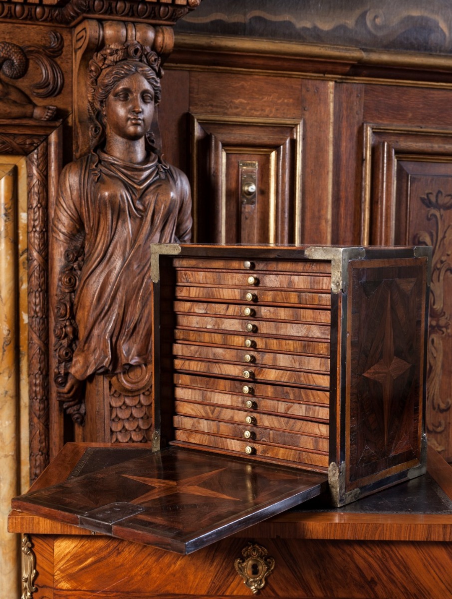 A Louis XIV rosewood and kingwood brass bound parquetry medal cabinet