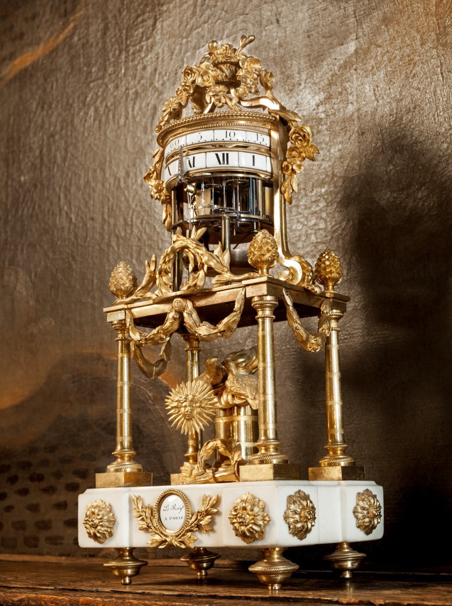 A late 18th century French ormolu and marble annular dial clock 