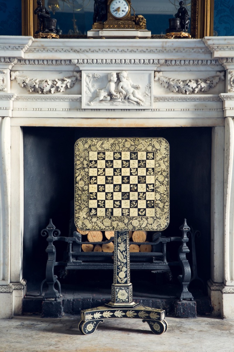 A Regency black and white decorated penwork occasional or games table 