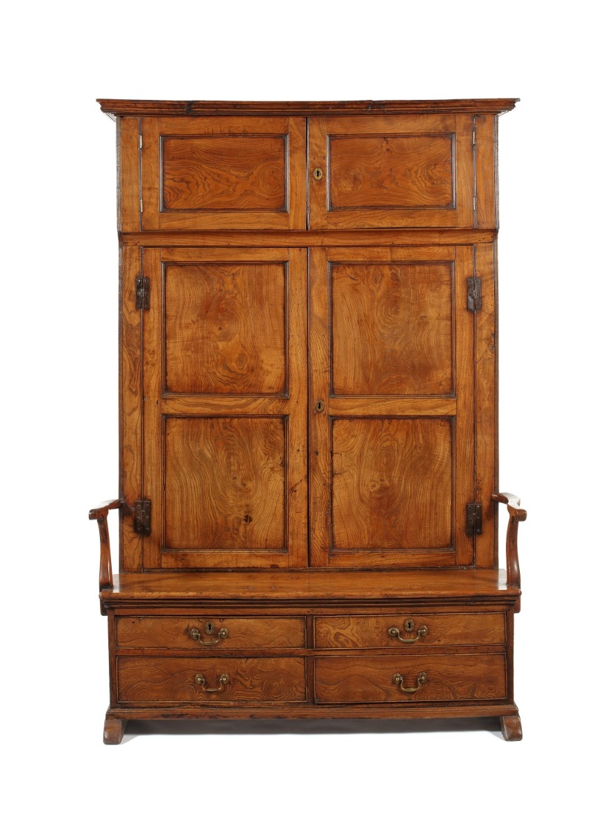 A George II figured ash panelled back bacon settle 